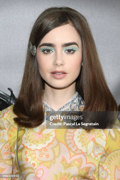 Lily Collins attends Miu Miu 2019 Cruise Collection Show at Hotel Regina on June 30, 2018 in Paris, France.