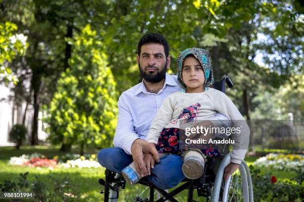 Syrian Maya Meri , who lost her legs during birth and since then started using artificial legs, which were made from pvc pipes and tin cans by her...