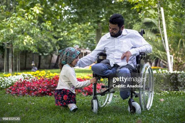 Syrian Maya Meri , who lost her legs during birth and since then started using artificial legs, which were made from pvc pipes and tin cans by her...