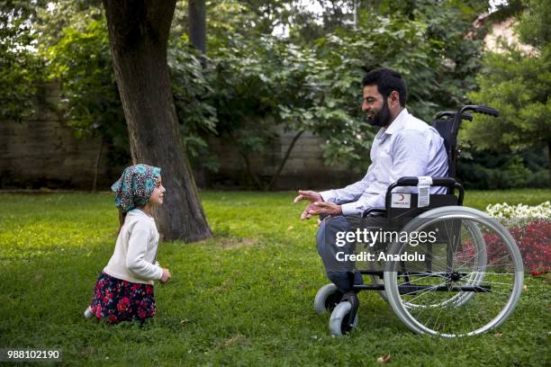 Syrian Maya Meri , who lost her legs during birth and since then started using artificial legs, which were made from pvc pipes and tin cans by her...