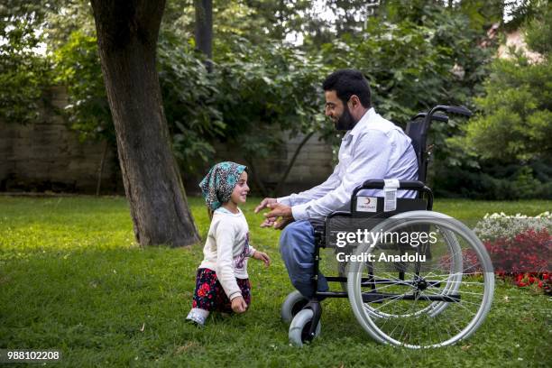 Syrian Maya Meri , who lost her legs during birth and since then started using artificial legs, which were made from pvc pipes and tin cans by her...