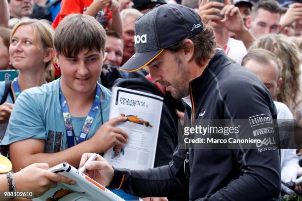 Fernando Alonso of Spain and McLaren F1 Team with the fans during the Formula One Grand Prix of Austria.