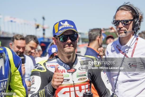 Cal Crutchlow of Great Britain and LCR Honda smiles and celebrates the second place at the end of the MotoGP Qualifying practice during the MotoGP...