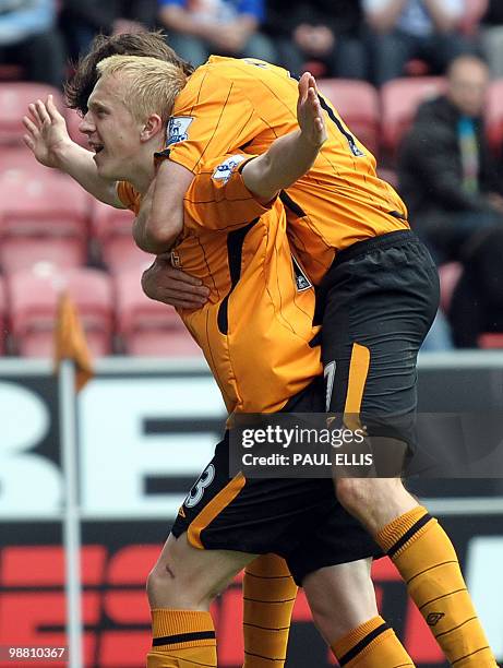 Hull City's Mark Cullen scores their second goal during their English Premier League football match against Wigan Athletic at The DW Stadium in...