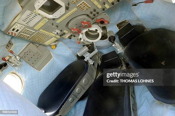 The interior of the reentry module of the Soyuz TM-19 mission is pictured after the capsule arrived at the airport in Frankfurt/M., western Germany,...