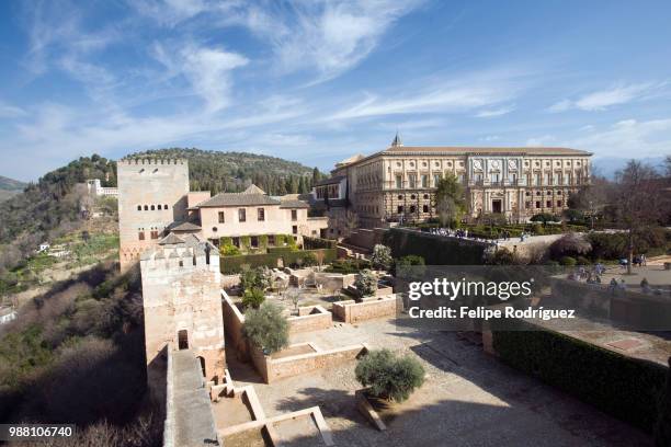 view of alcazaba (left) and palace of charles v (right), alhambra, granada, spain - alcazaba of alhambra stock pictures, royalty-free photos & images