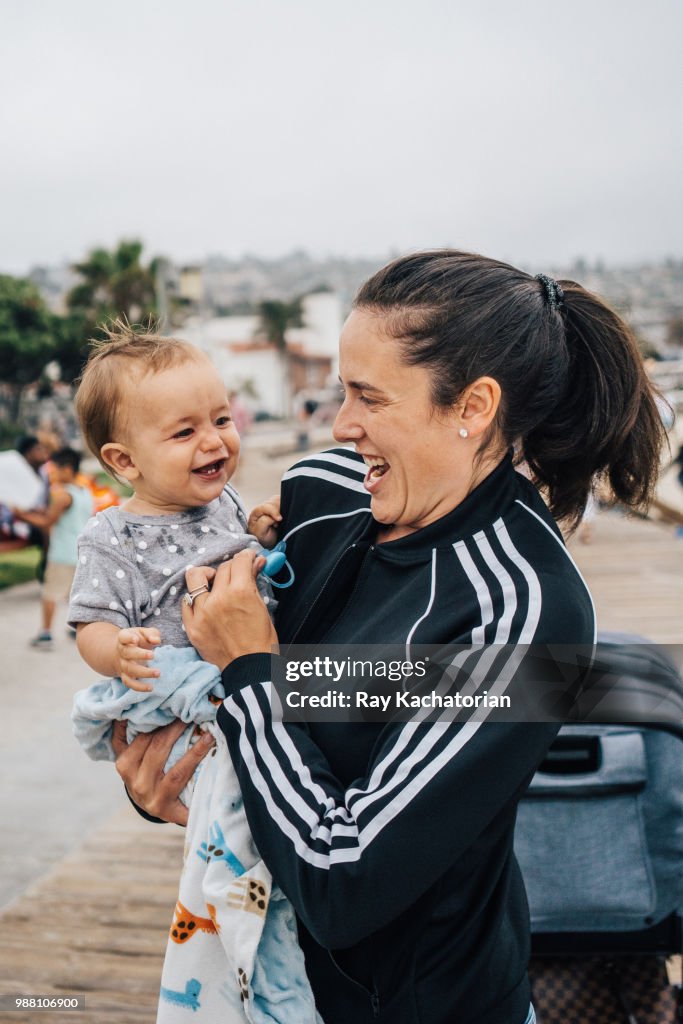 Mother laughing with child