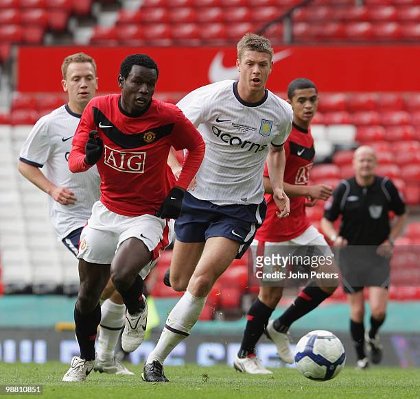 Mame Biram Diouf of Manchester United in action during the Barclays Premier Reserve League Play-Off match between Manchester United Reserves and...