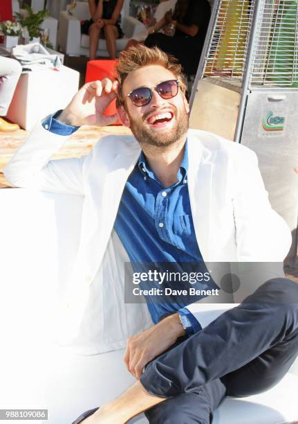 Douglas Booth attends the Audi Polo Challenge at Coworth Park Polo Club on June 30, 2018 in Ascot, England.