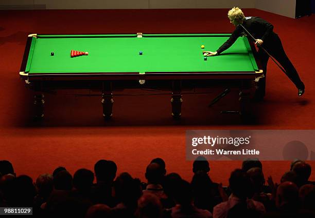 Neil Robertson of Australia in action against Graeme Dott of Scotland during the final of the Betfred.com World Snooker Championships at The Crucible...