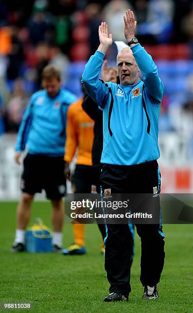 Iain Dowie of Hull City applauds the fans after his side is relagated during the Barclays Premier League match between Wigan Athletic and Hull City...