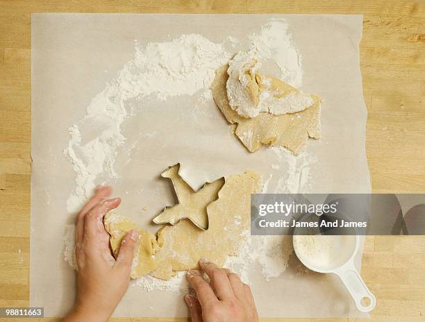 making airplane cookie with cutter. - tablespoon stock pictures, royalty-free photos & images