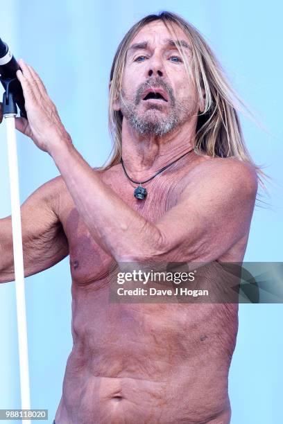 Iggy Pop supports Queens of the Stone Age on stage at Finsbury Park on June 30, 2018 in London, England.