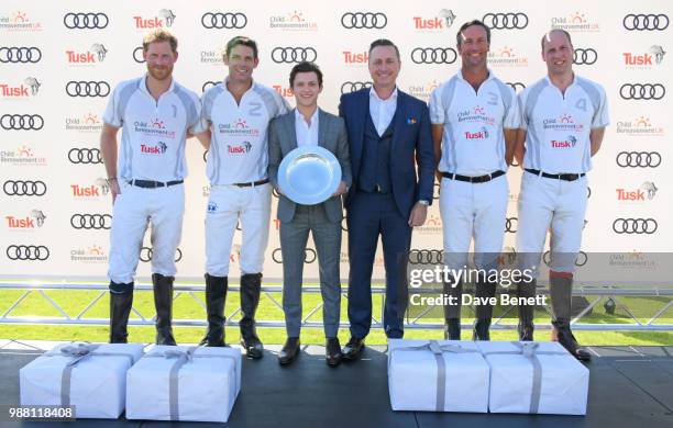Prince Harry, Duke of Sussex, Malcolm Borwick, Tom Holland, Andrew Doyle, JP Clarkin and Prince William, Duke of Cambridge, attend the Audi Polo...