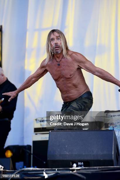 Iggy Pop supports Queens of the Stone Age on stage at Finsbury Park on June 30, 2018 in London, England.