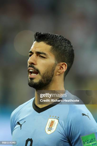 Luis Suarez of Uruguay sings the national anthem prior to the 2018 FIFA World Cup Russia Round of 16 match between Uruguay and Portugal at Fisht...