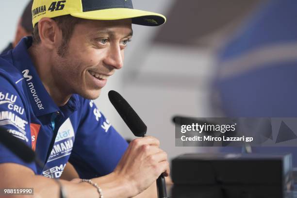 Valentino Rossi of Italy and Movistar Yamaha MotoGP smiles during the prees conference at the end of the Qualifying practice during the MotoGP...