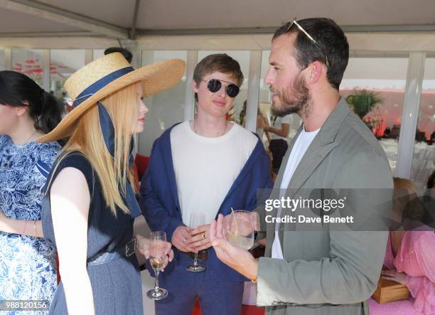 Ellie Bamber, Lucas Bamber and Sam Claflin attend the Audi Polo Challenge at Coworth Park Polo Club on June 30, 2018 in Ascot, England.