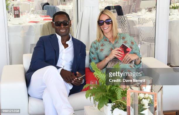 David Harewood and Kirsty Handy attend the Audi Polo Challenge at Coworth Park Polo Club on June 30, 2018 in Ascot, England.