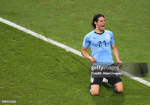 Edinson Cavani of Uruguay celebrates after scoring his team's first goal during the 2018 FIFA World Cup Russia Round of 16 match between Uruguay and...