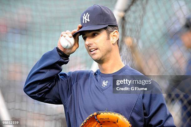 Jorge Posada of the New York Yankees warms up before the game against the Baltimore Orioles at Camden Yards on April 28, 2010 in Baltimore, Maryland.