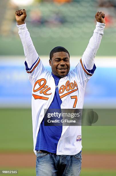 Tracy Morgan throws out the opening pitch before the game between the New York Yankees and the Baltimore Orioles at Camden Yards on April 28, 2010 in...