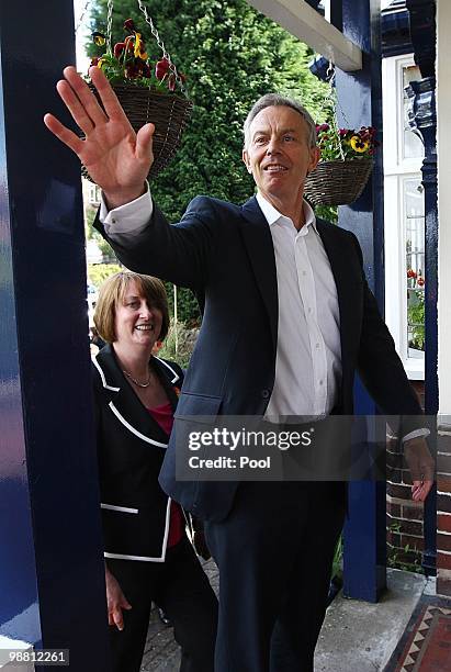 Former Prime Minister Tony Blair waves whilst out campaigning with former Home Secretary Jacqui Smith in her Redditch constituency on May 3, 2010 in...