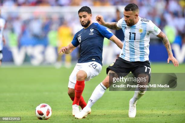 Nabil Fekir of France competes with Nicolas Otamendi of Argentina during the 2018 FIFA World Cup Russia Round of 16 match between France and...