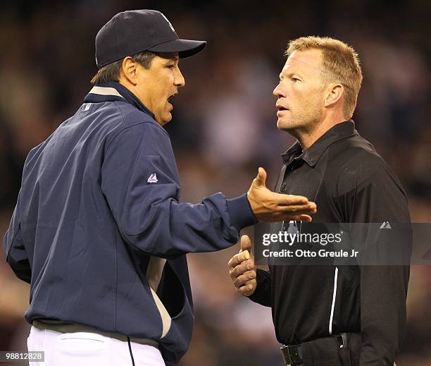 Manager Don Wakamatsu of the Seattle Mariners argues a call with umpire Jim Wolf against the Texas Rangers at Safeco Field on April 30, 2010 in...