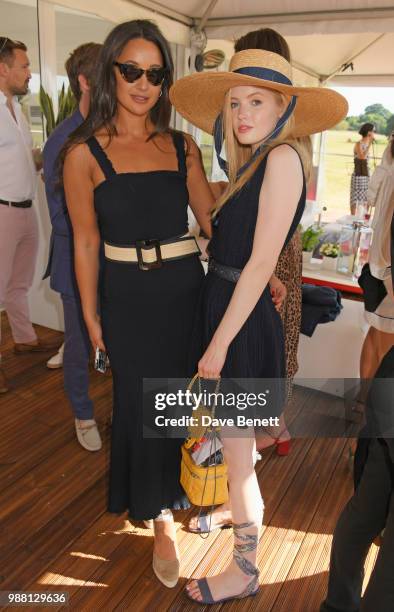 Roxie Nafousi and Ellie Bamber attend the Audi Polo Challenge at Coworth Park Polo Club on June 30, 2018 in Ascot, England.