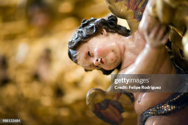 carved angel from the float of jesus del gran poder, seville, spain - poder stock-fotos und bilder