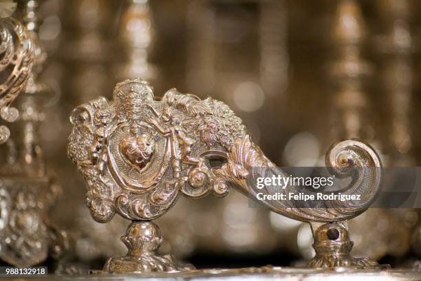 the "llamador" or knocker from the virgin float, gran poder brothehood, seville, spain - poder stock pictures, royalty-free photos & images