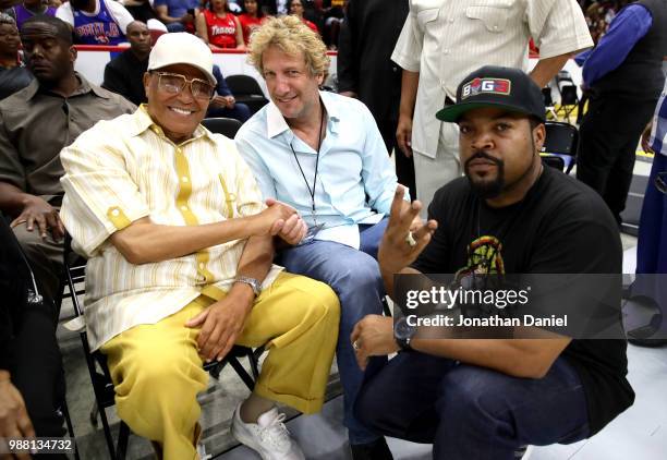 American religious leader, Louis Farrakhan, sits with BIG3 co-founders Jeff Kwatinetz and Ice Cube during week two of the BIG3 three on three...