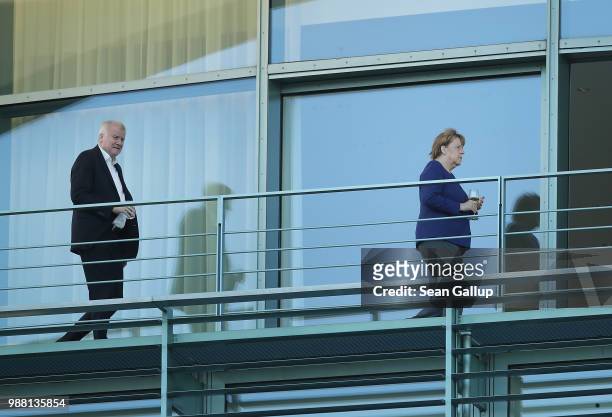 German Chancellor and leader of the German Christian Democrats Angela Merkel and German Interior Minister and leader of the Bavarian Christian...