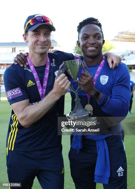 Dale Steyn and Fidel Edwards of Hampshire celebrate with the Royal London One-Day trophy at the end of the Royal London One-Day final match between...