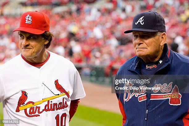 Tony LaRussa of the St. Louis Cardinals and Bobby Cox of the Atlanta Braves during a pre-game ceremony at Busch Stadium on April 28, 2010 in St....