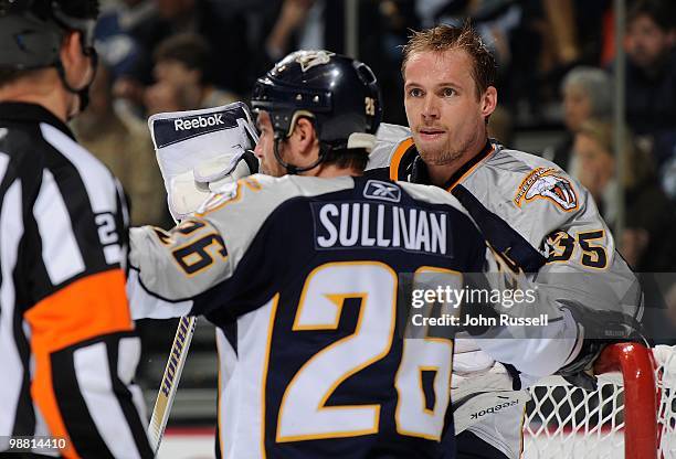 Pekka Rinne and Steve Sullivan of the Nashville Predators skate against the Chicago Blackhawks in Game Six of the Western Conference Quarterfinals...