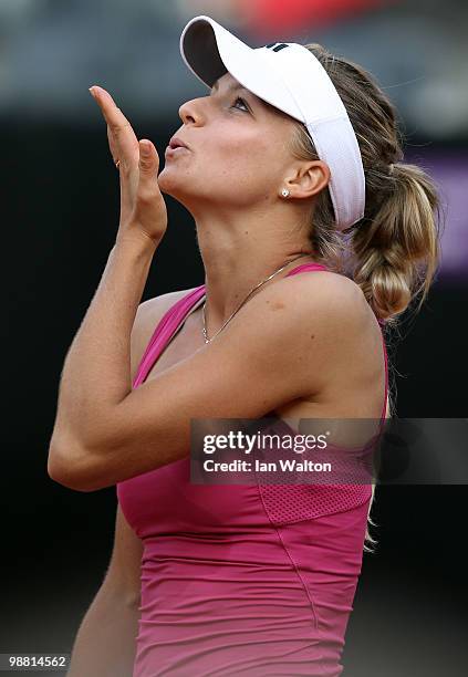 Maria Kirilenko of Russia celebrates winning her match against Svetlana Kuznetsova of Russia during Day one of the Sony Ericsson WTA Tour at the Foro...