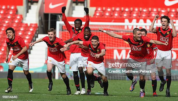 Rafael Da Silva. William Keane, Mame Biram Diouf, Joe Dudgeon and Federico Macheda of Manchester United celebrate after the Barclays Premier Reserve...