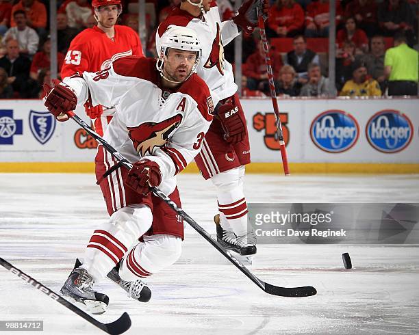 Vernon Fiddler of the Phoenix Coyotes shoots the puck into the offensive end of the ice during Game Four of the Eastern Conference Quarterfinals of...