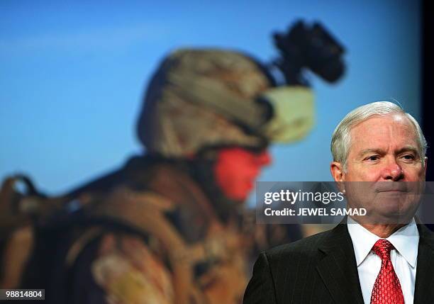 Defense Secretary Robert Gates arrives to speak during the Navy League Sea-Air-Space Exposition at the Gaylord National Resort on the National...