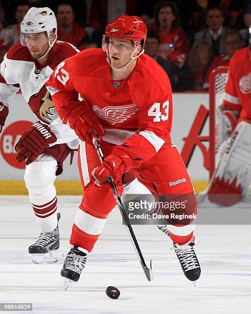 Darren Helm of the Detroit Red Wings skates with the puck during Game Four of the Eastern Conference Quarterfinals of the 2010 NHL Stanley Cup...