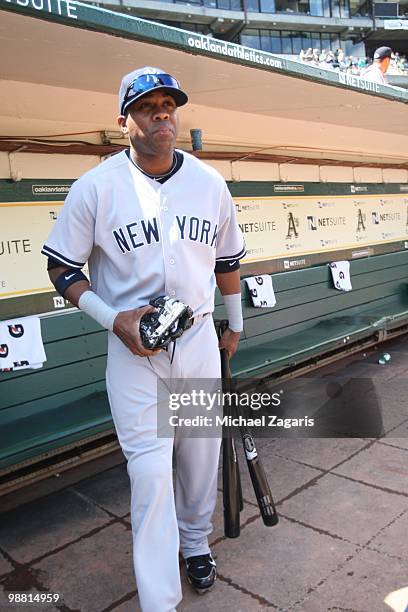 Marcus Thames of the New York Yankees standing in the dugout prior to the game against the Oakland Athletics at the Oakland Coliseum on April 22,...