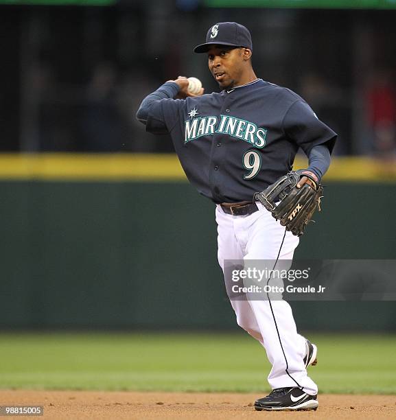 Second baseman Chone Figgins of the Seattle Mariners throws to first base against the Texas Rangers at Safeco Field on April 30, 2010 in Seattle,...