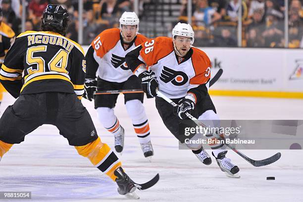 Darroll Powe of the Philadelphia Flyers skates with the puck against the Boston Bruins in Game One of the Eastern Conference Semifinals during the...