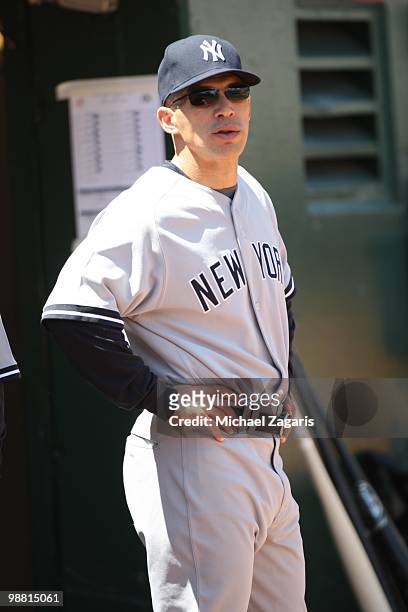 Manager Joe Girardi of the New York Yankees standing in the dugout during the game against the Oakland Athletics at the Oakland Coliseum on April 22,...