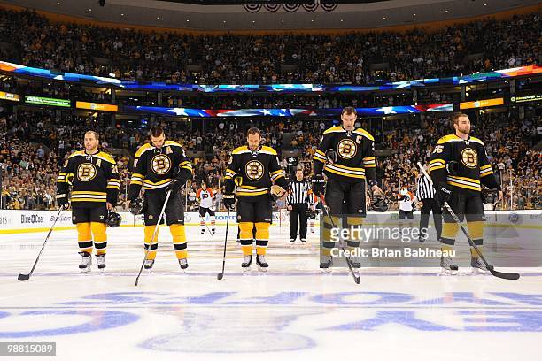 Mark Recchi, Patrice Bergeron, Marco Sturm, Zdeno Chara and Johnny Boychuk of the Boston Bruins stand during the National Anthem before the game...
