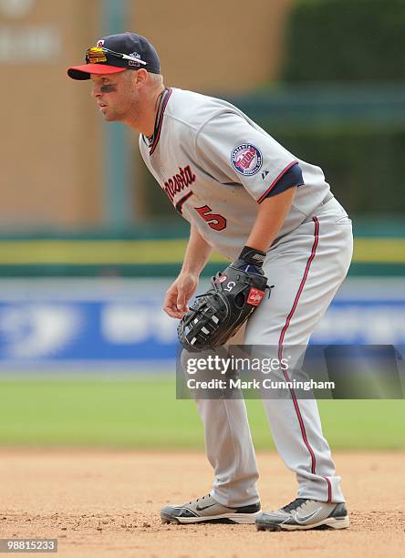 Michael Cuddyer of the Minnesota Twins fields against the Detroit Tigers during the game at Comerica Park on April 29, 2010 in Detroit, Michigan. The...