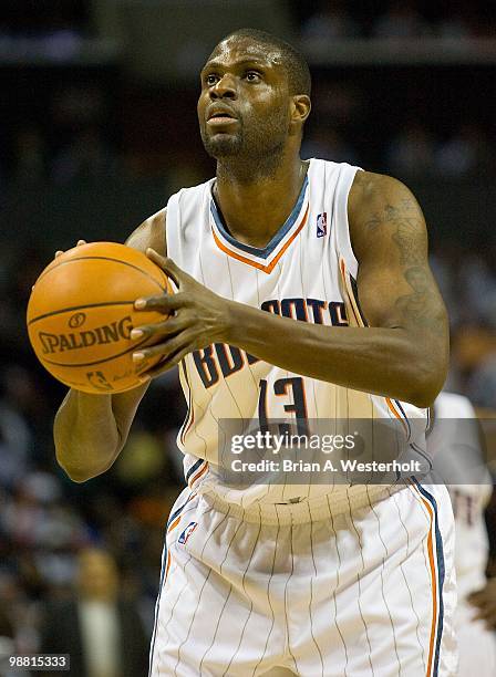 Nazr Mohammed of the Charlotte Bobcats attempts a free throw against the Orlando Magic at Time Warner Cable Arena on April 26, 2010 in Charlotte,...