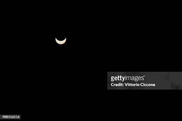 partial solar eclipse - ciccione stock pictures, royalty-free photos & images